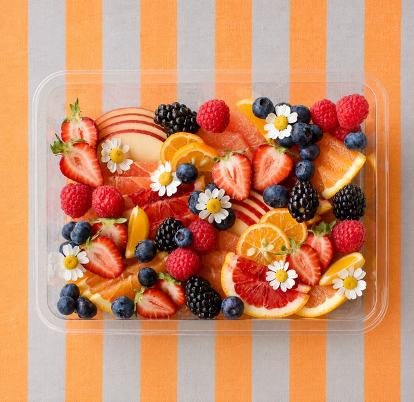 Lady & Larder farmers market fruit box on orange background